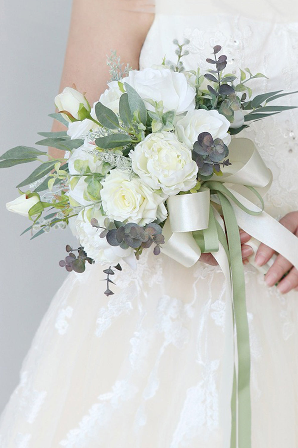 White Hand Holding Flower Bridal Bouquet with Bow