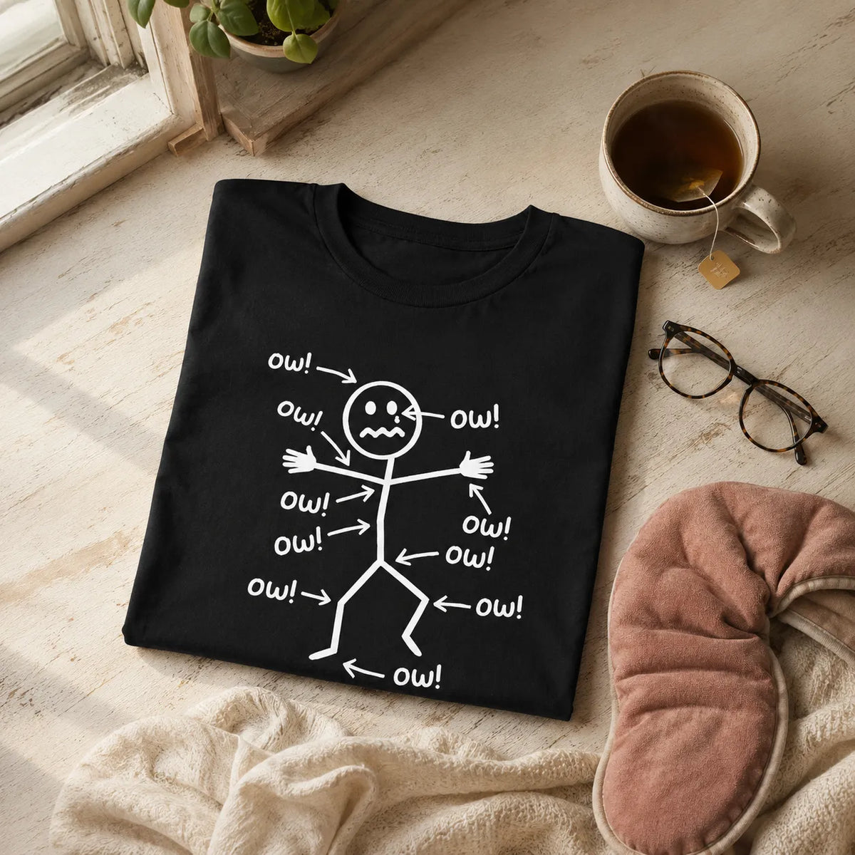 Achewear – Funny Ow! Stick Figure Graphic Tee. Relaxed Fit Cotton-like T-Shirt for Women & Men