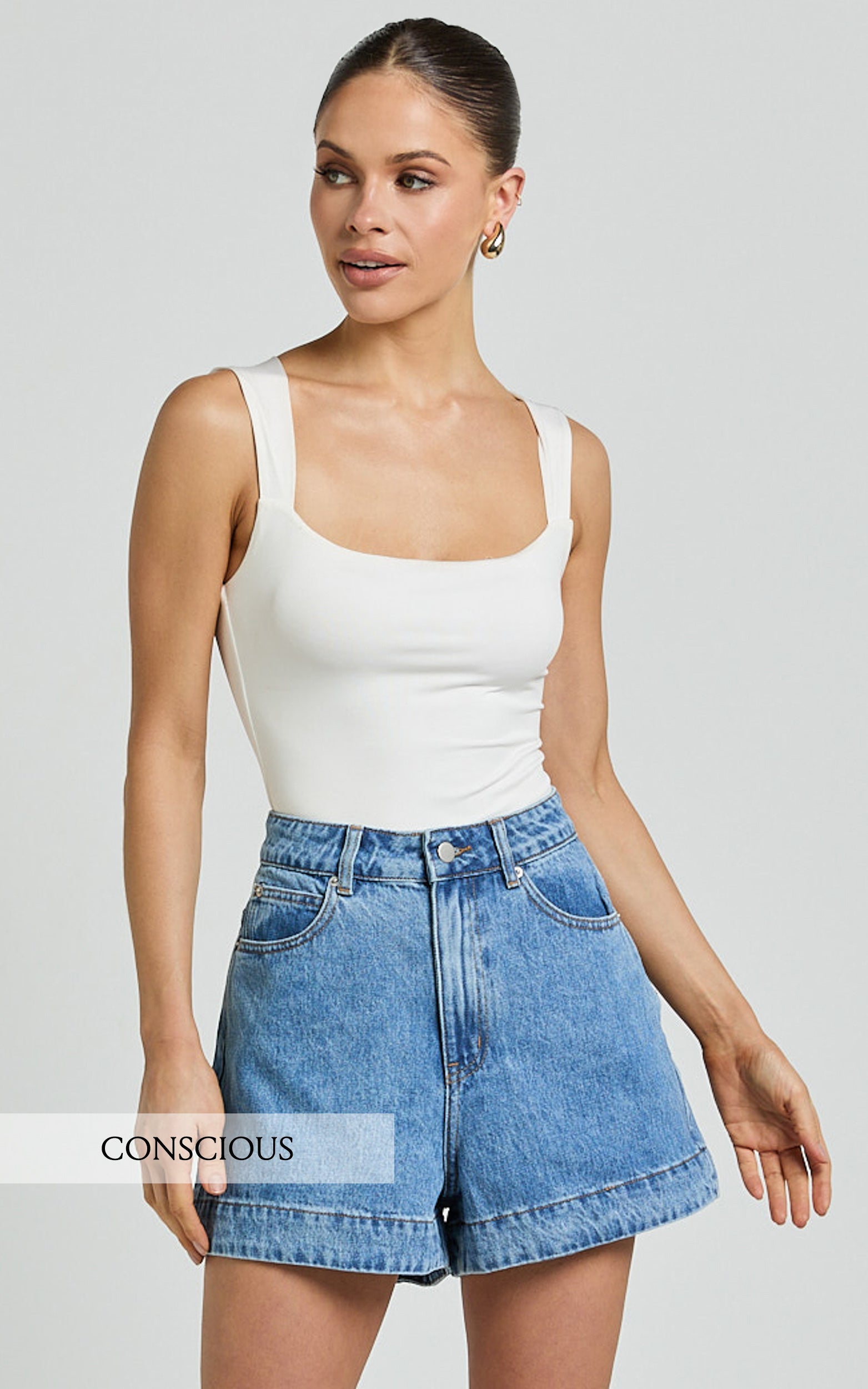 Rhianna Shorts - Mid Waist Recycled Denim Shorts in Mid Blue Wash