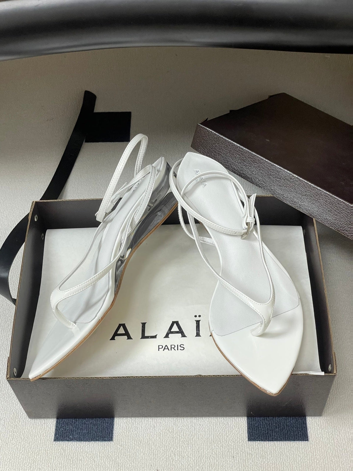 Alaia Invisible Thong Sandals 3cm White Patent Leather 835286