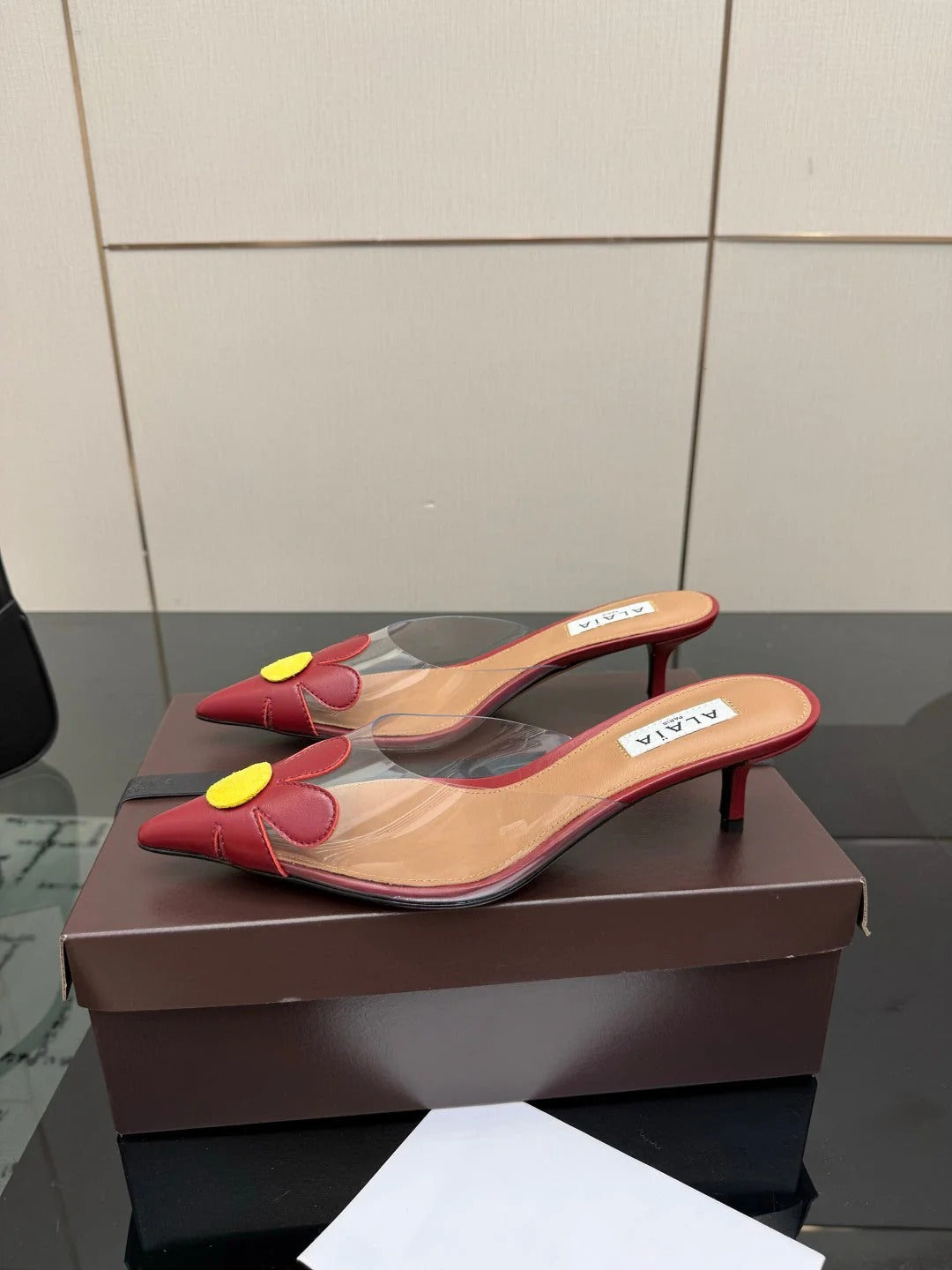 Alaia 2026 Mules 55 PVC Sheepskin 803333