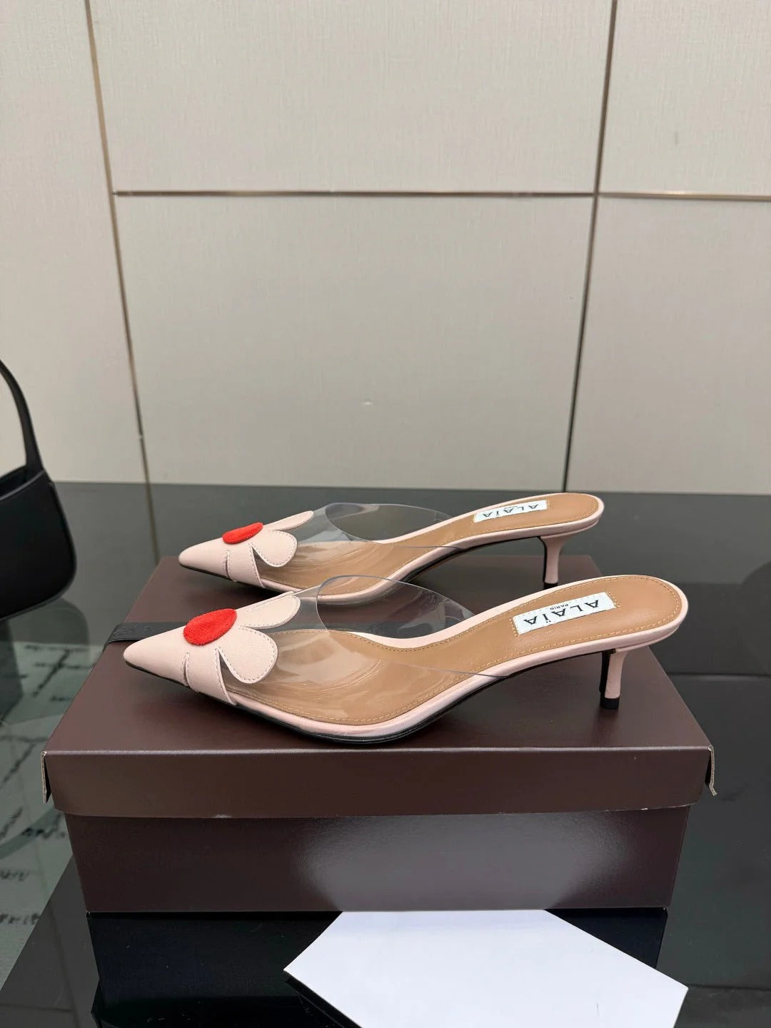 Alaia 2026 Mules 55 PVC Sheepskin 803333